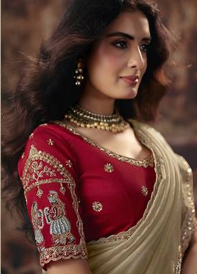 Beige gold shimmer saree faux organza saree with red embroidered blouse 2