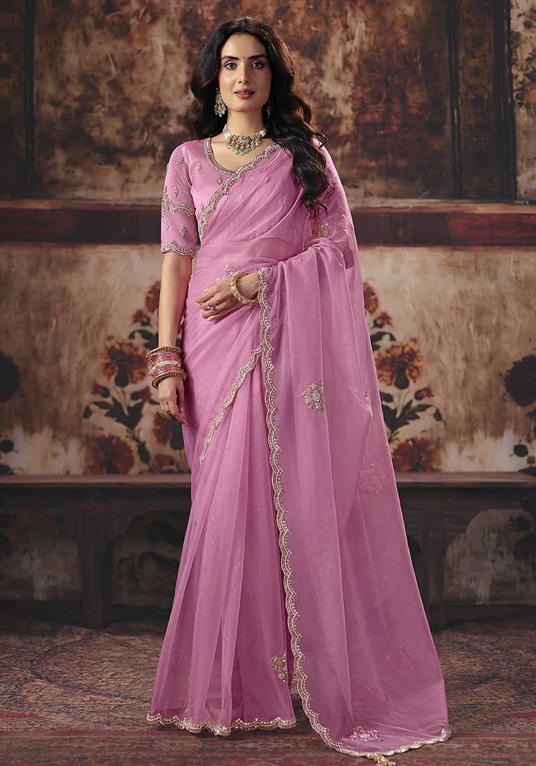 Pink shimmer faux organza saree with scalloped zari border & embroidered blouse