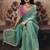 Sea green shimmer faux organza saree with pink embroidered blouse