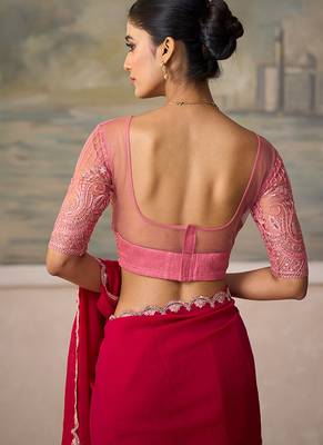 Rani pink faux georgette embroidered saree with blouse piece 4