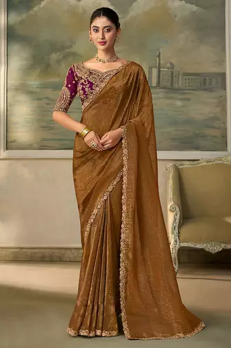 Brown faux georgette embroidered saree with wine blouse