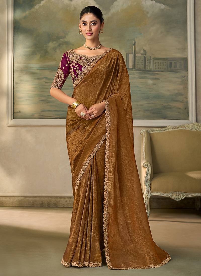 Brown faux georgette embroidered saree with wine blouse