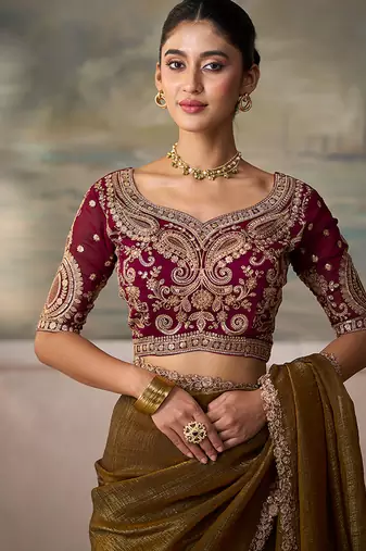 Brown faux georgette embroidered saree with wine blouse