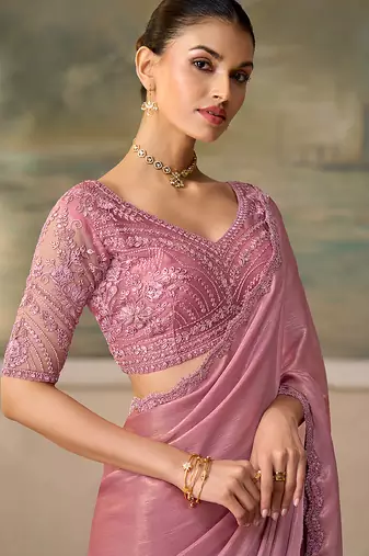 Blush pink faux chiffon embroidered saree with blouse piece