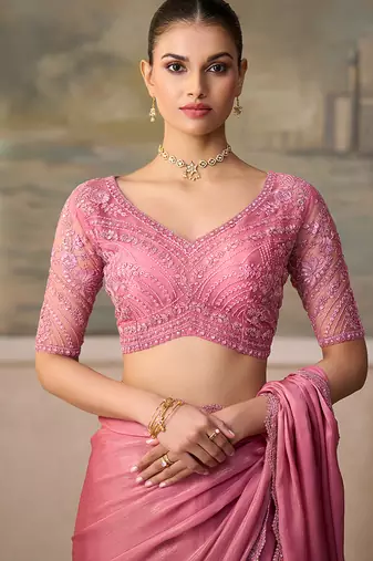 Blush pink faux chiffon embroidered saree with blouse piece