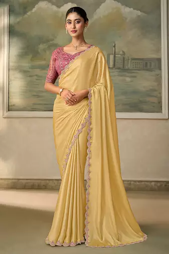 Light yellow faux chiffon saree with embroidered tussar blouse