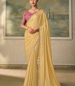 Light yellow faux chiffon saree with embroidered tussar blouse