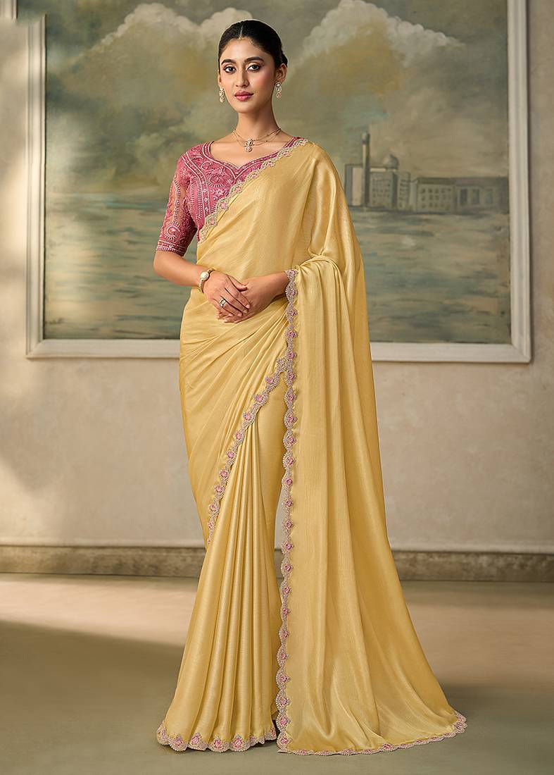 Light yellow faux chiffon saree with embroidered tussar blouse