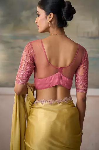 Light yellow faux chiffon saree with embroidered tussar blouse