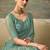 Sea green faux chiffon saree with embroidered blouse
