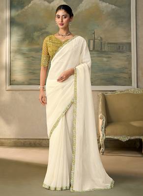 Off-white faux georgette saree with embroidered olive tussar blouse 1