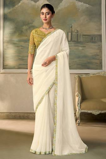 Off-white faux georgette saree with embroidered olive tussar blouse