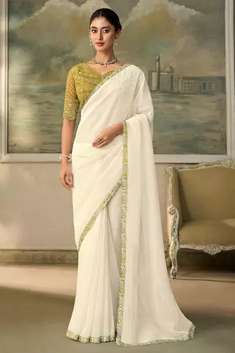 Off-white faux georgette saree with embroidered olive tussar blouse