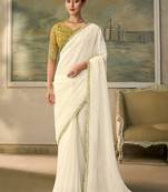 Off-white faux georgette saree with embroidered olive tussar blouse