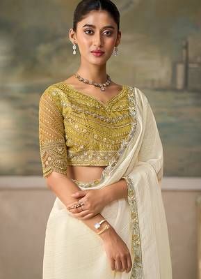 Off-white faux georgette saree with embroidered olive tussar blouse 2