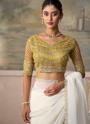Off-white faux georgette saree with embroidered olive tussar blouse 3