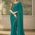 Teal faux georgette saree with embroidered antique gold blouse