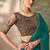 Teal faux georgette saree with embroidered antique gold blouse