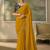Mustard yellow faux georgette saree with embroidered navy blue blouse