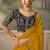 Mustard yellow faux georgette saree with embroidered navy blue blouse