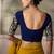 Mustard yellow faux georgette saree with embroidered navy blue blouse
