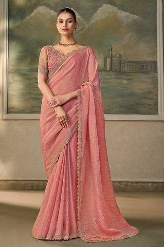 Peach pink faux tissue saree with embroidered blouse