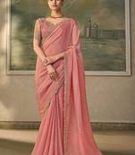 Peach pink faux tissue saree with embroidered blouse