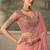 Peach pink faux tissue saree with embroidered blouse