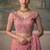 Peach pink faux tissue saree with embroidered blouse