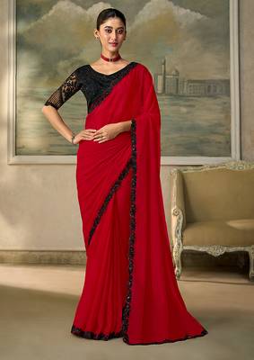 Red faux chiffon saree with black embroidered border and  blouse 1