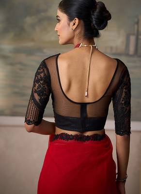 Red faux chiffon saree with black embroidered border and  blouse 4