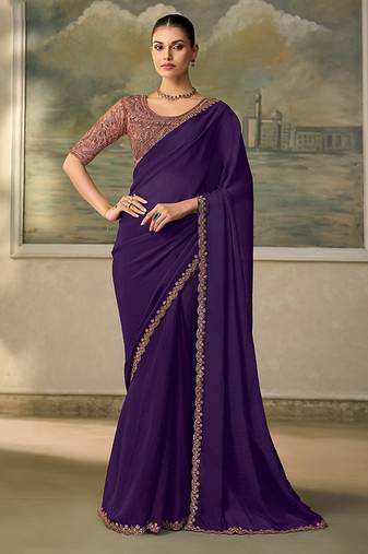 Dark purple faux  georgette saree with embroidered border & rose-gold blouse