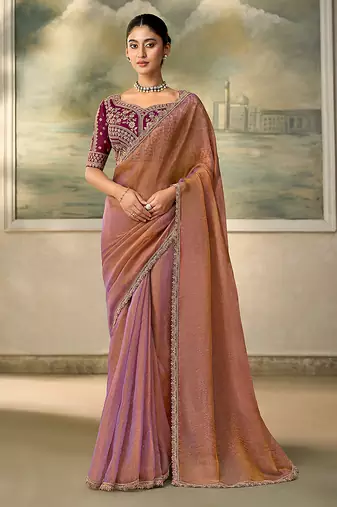 Rose gold metallic faux georgette saree with embroidered wine blouse