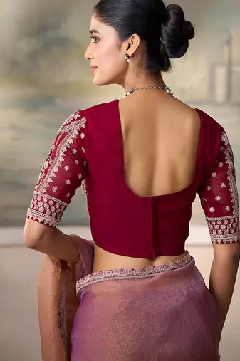 Rose gold metallic faux georgette saree with embroidered wine blouse