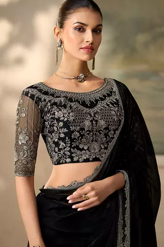 Black faux chiffon saree with embroidered cutwork border & blouse