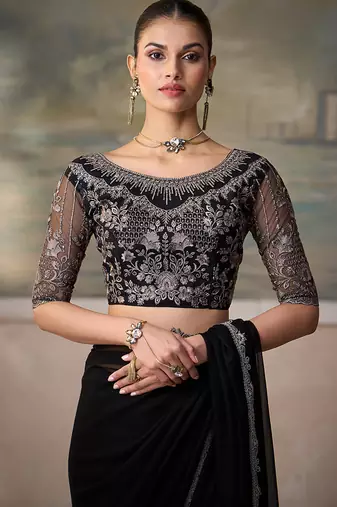 Black faux chiffon saree with embroidered cutwork border & blouse
