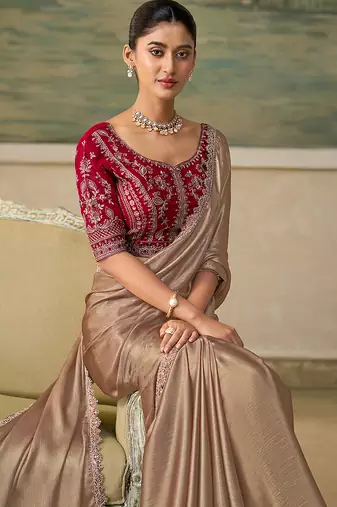 Chiku faux chiffon saree with rich red embroidered blouse