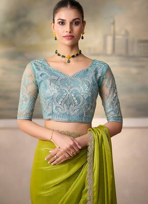 Lime green shimmer faux satin saree with sky blue embroidered blouse 3