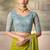 Lime green shimmer faux satin saree with sky blue embroidered blouse
