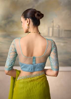 Lime green shimmer faux satin saree with sky blue embroidered blouse 4
