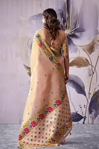 light peach tissue floral weaving saree 