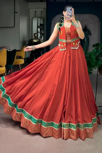 Women Rust Orange Chanderi Pleated Free Size Lehenga Choli with Gamthi Work Koti Jacket