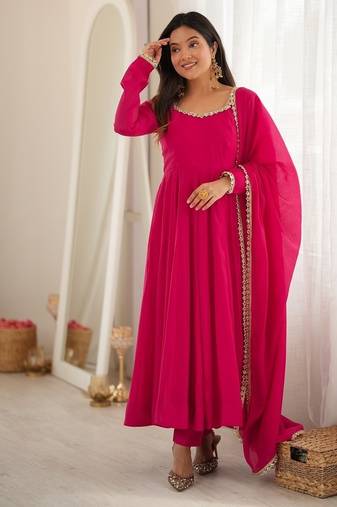 Festive wear rani pink solid anarkali kurti with trousers & lace border dupatta set for women