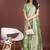 light green cotton blend saree with woven zari pallu