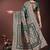Dark green silk blend saree with zari woven pallu