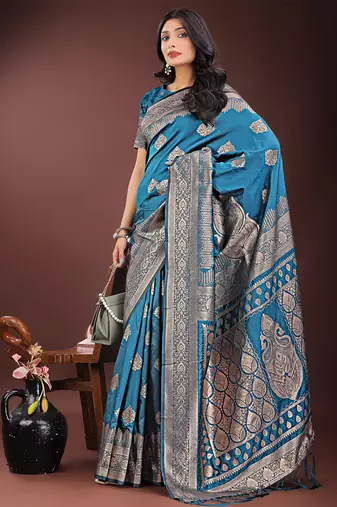 Teal blue silk blend saree with zari woven pallu