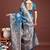 Teal blue banarasi silk blend floral woven saree