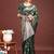 Dark green banarasi silk blend saree with silver zari buta work