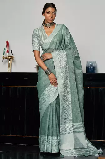 Sea green linen blend saree with zari border