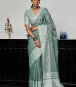 Sea green linen blend saree with zari border